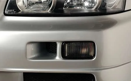 Nismo Grey Smoke Front Winker for Skyline R34 (up to August 2000)